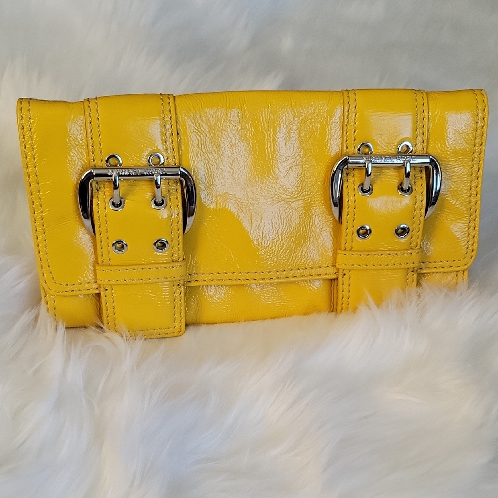 Michael Kors Yellow Leather Clutch with Buckle Accents Magnetic closure